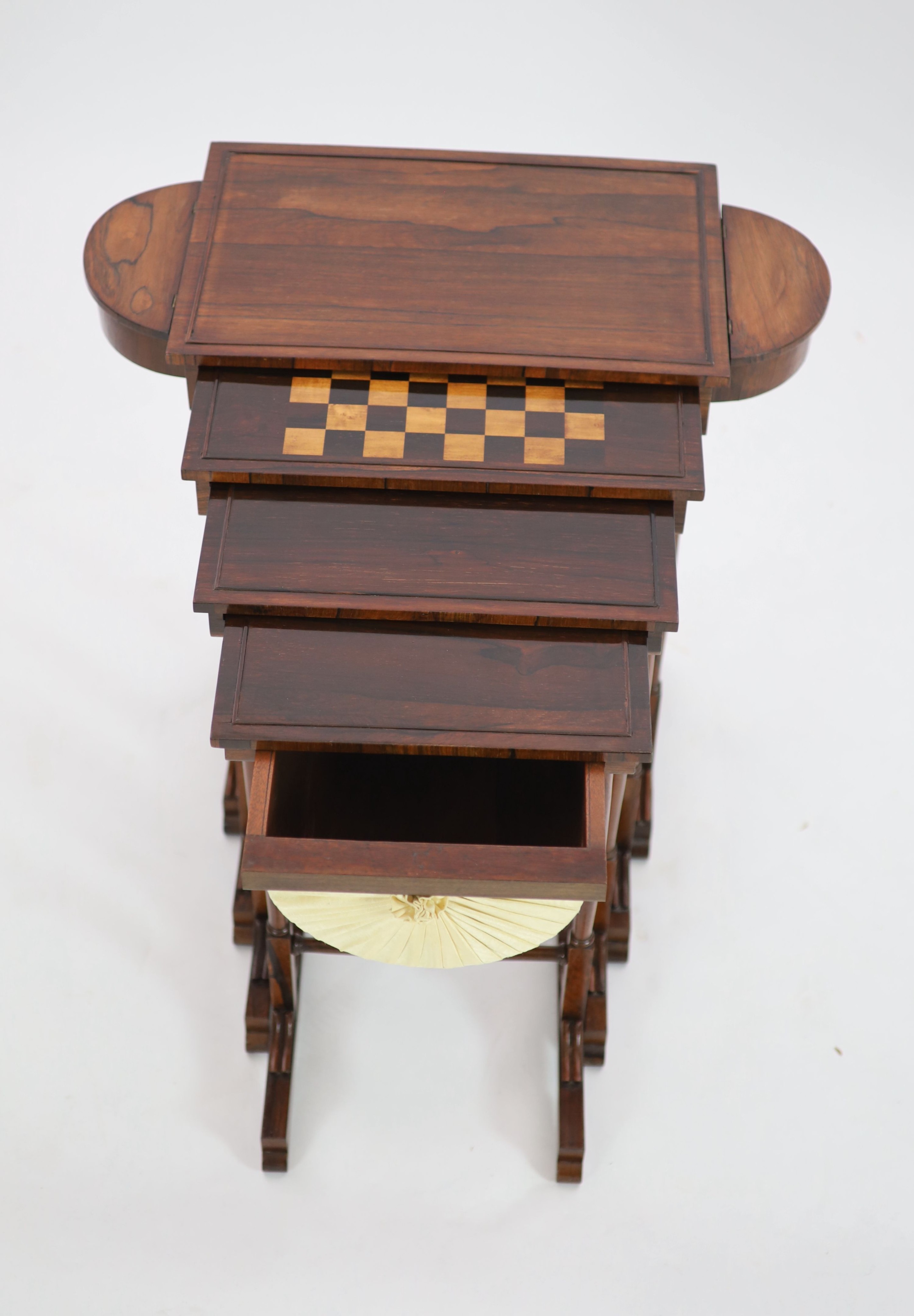 An unusual George IV nest of rosewood quartetto sewing tables, W.68cm D.32cm H.69cm